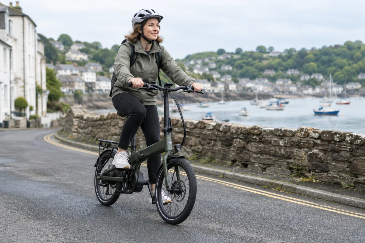 Cyclist or mechanic demonstrating practical considerations for MiRiDER e-bikes: company and UK buying guide