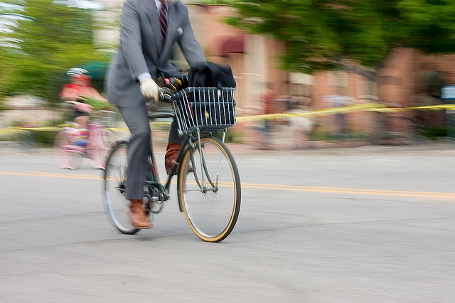 Business man riding a bike
