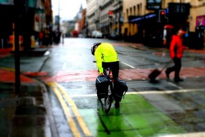 Cyclist stopped at the lights